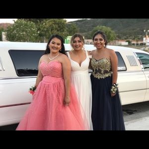 Selling prom dress on the right the navy blue one